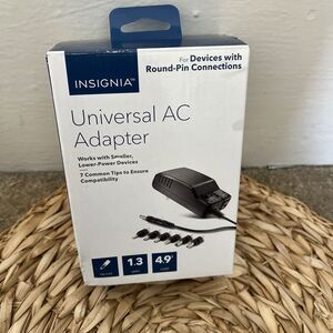 New in box Insignia NSPWLC593 Slim Universal AC Power Adapter with 7 tips